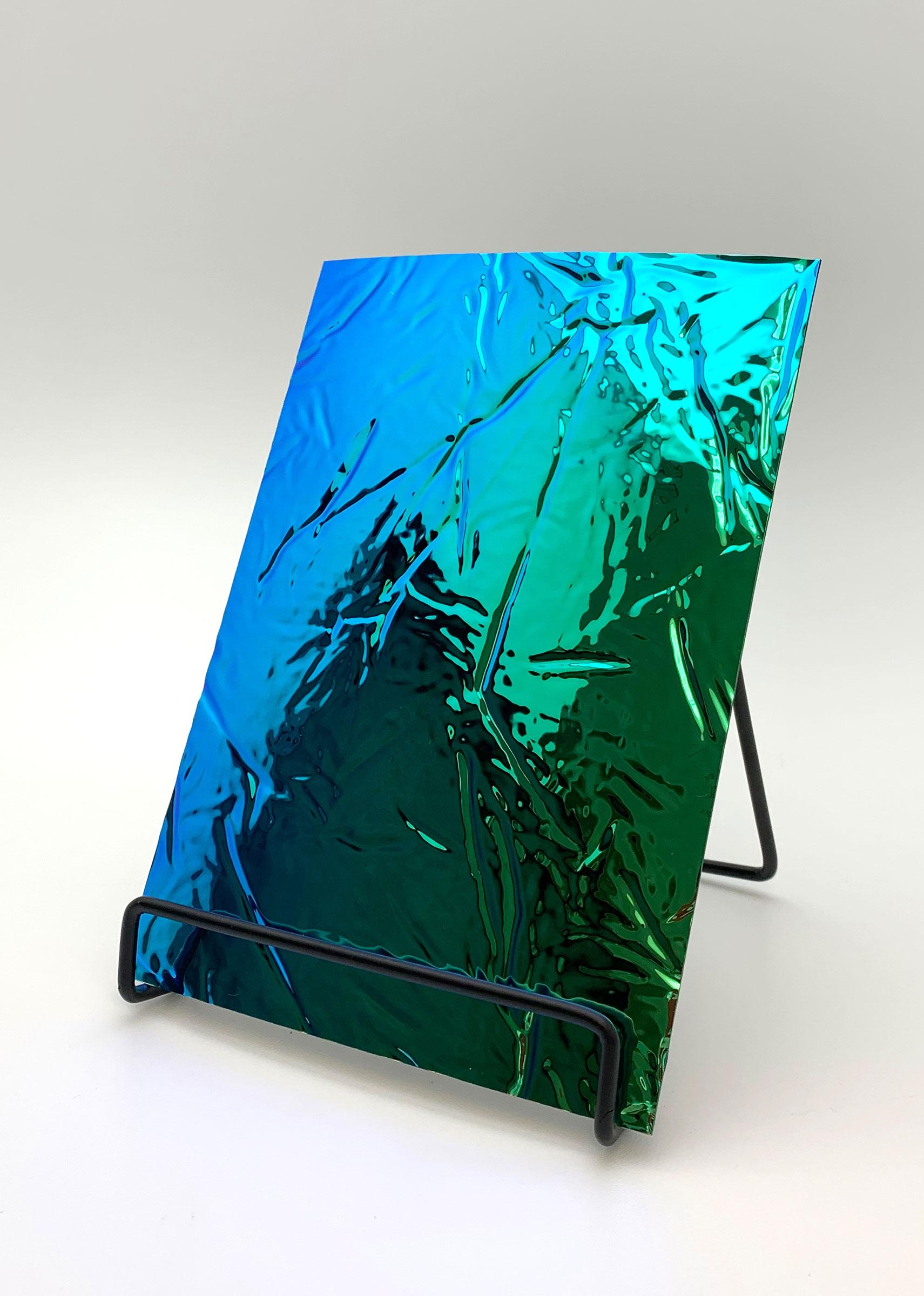 Elements Texture Aqua Wrinkle real material sample - a crumpled, colour-shifting aqua-to-green mirror surface