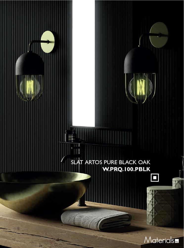 Slat Artos Pure Black Oak fluted wall panel behind a brass vessel sink and black wall sconces