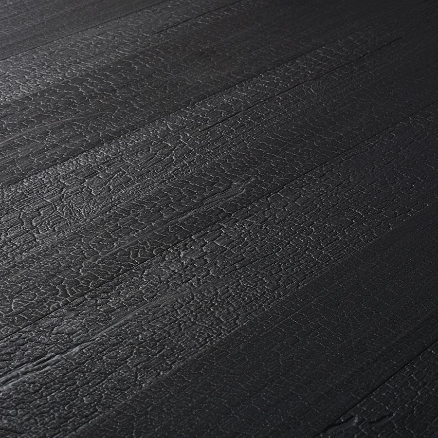 Prensa Bruciato Black real material sample - charred black wood with crackled texture