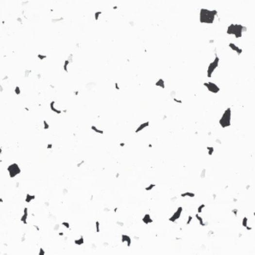 Eco-Flakes Cookies & Cream real material sample - recycled composite panel with scattered flakes