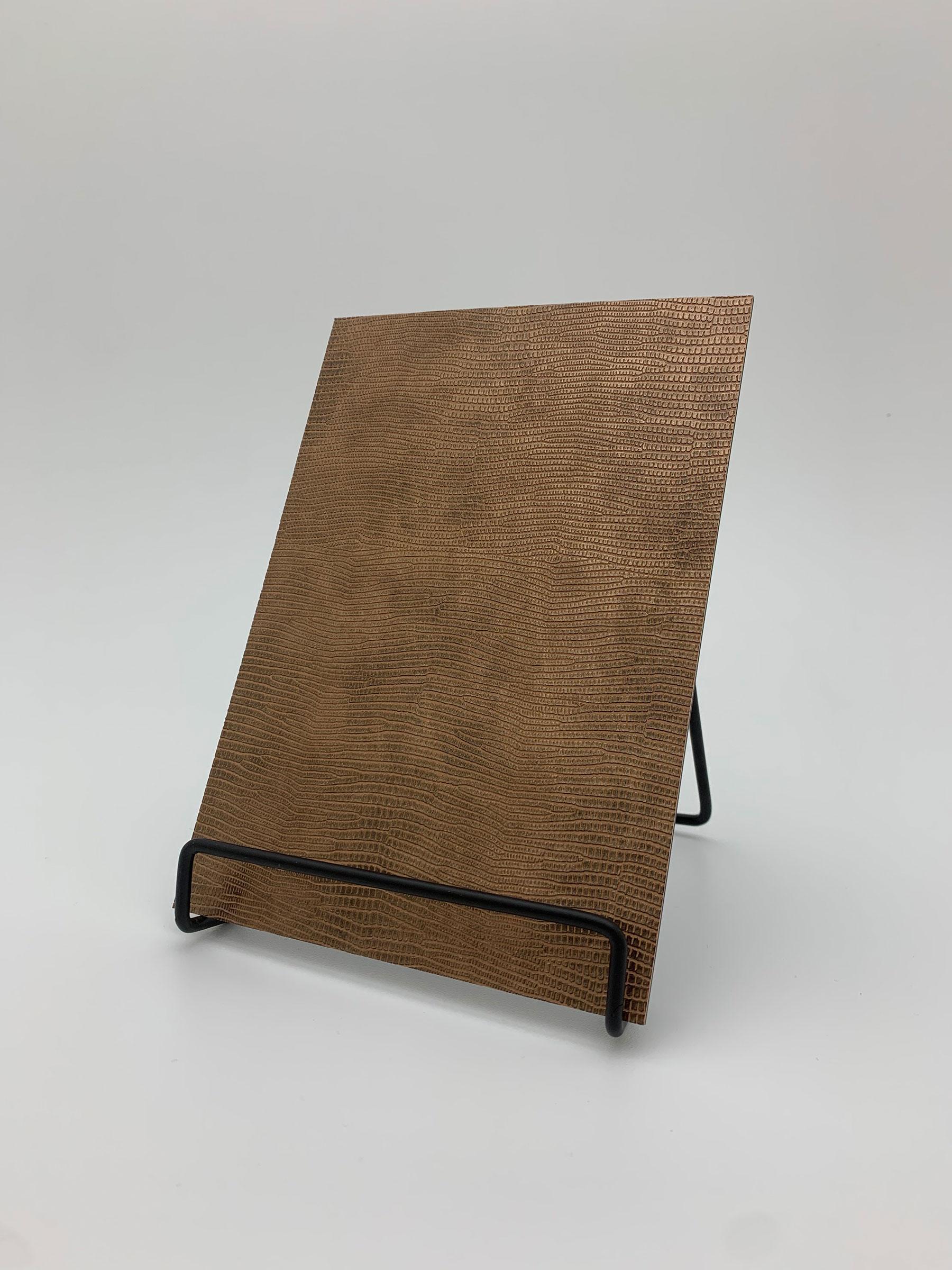 Elements Copper Luxe Leather real material sample - a fine reptile-scale leather grain in copper brown