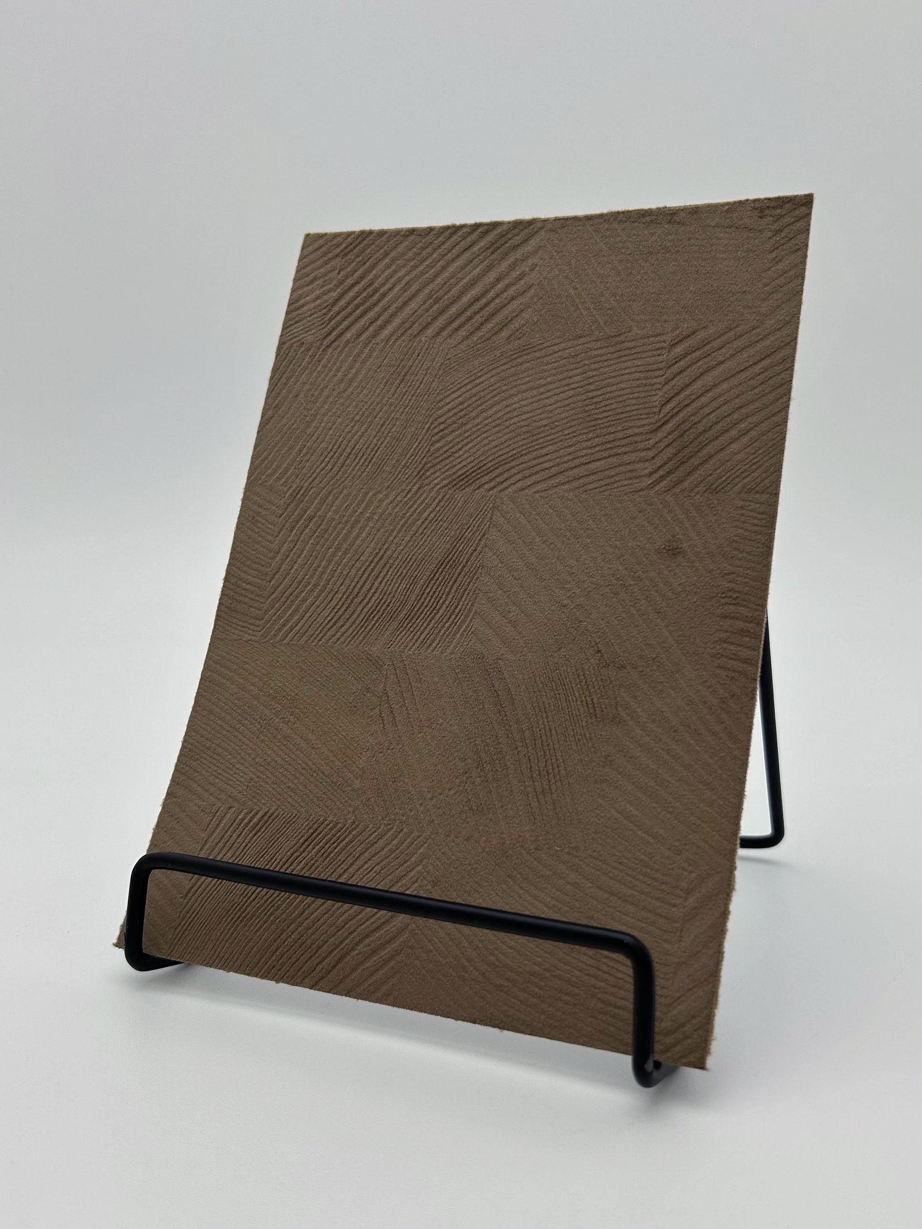 Elements Textile Drift Brown Velvet real material sample - brown velvet-touch panel with sweeping wood-grain-like swirls