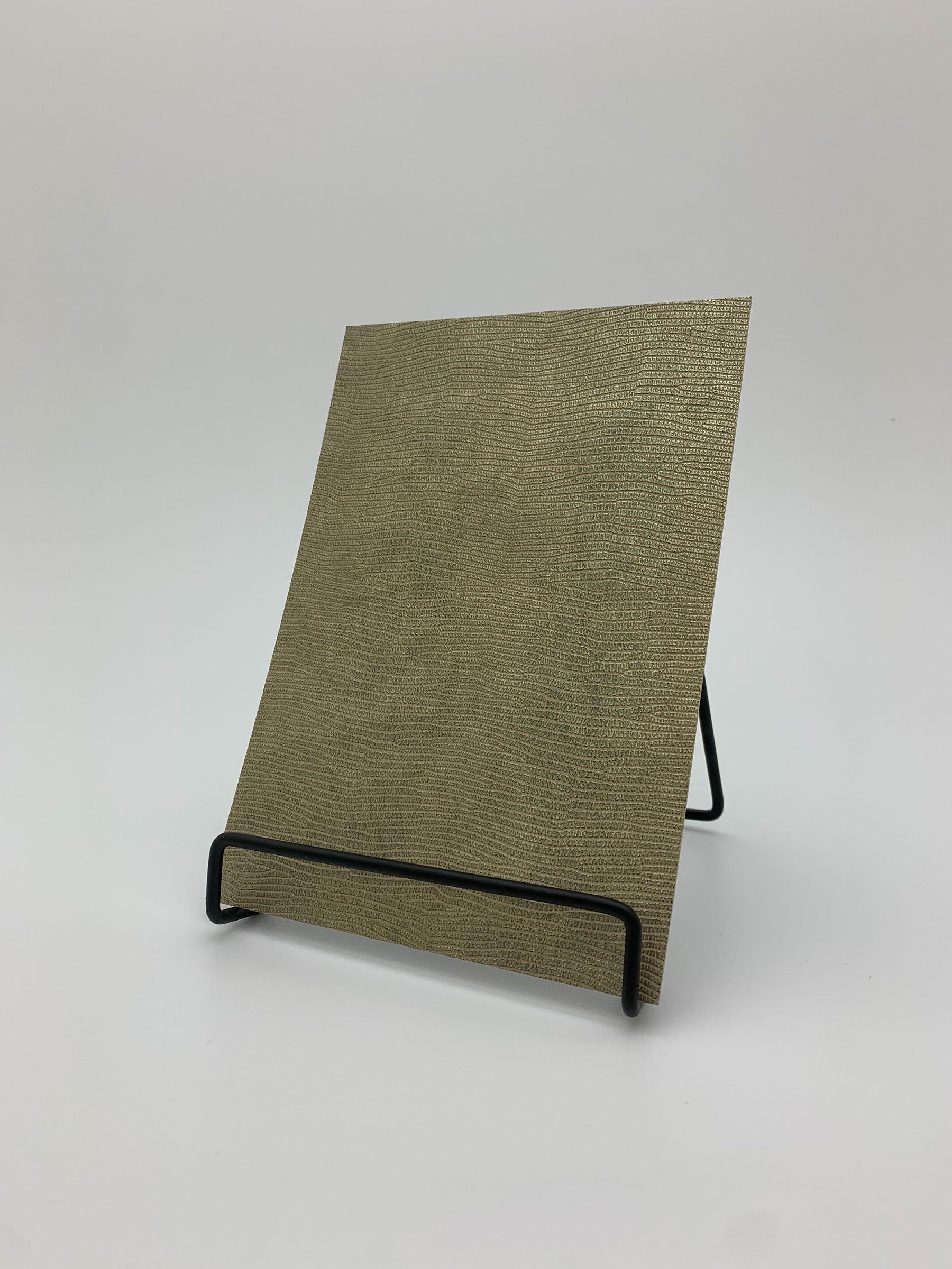 Elements Gold Luxe Leather real material sample - a fine reptile-scale leather grain in olive gold