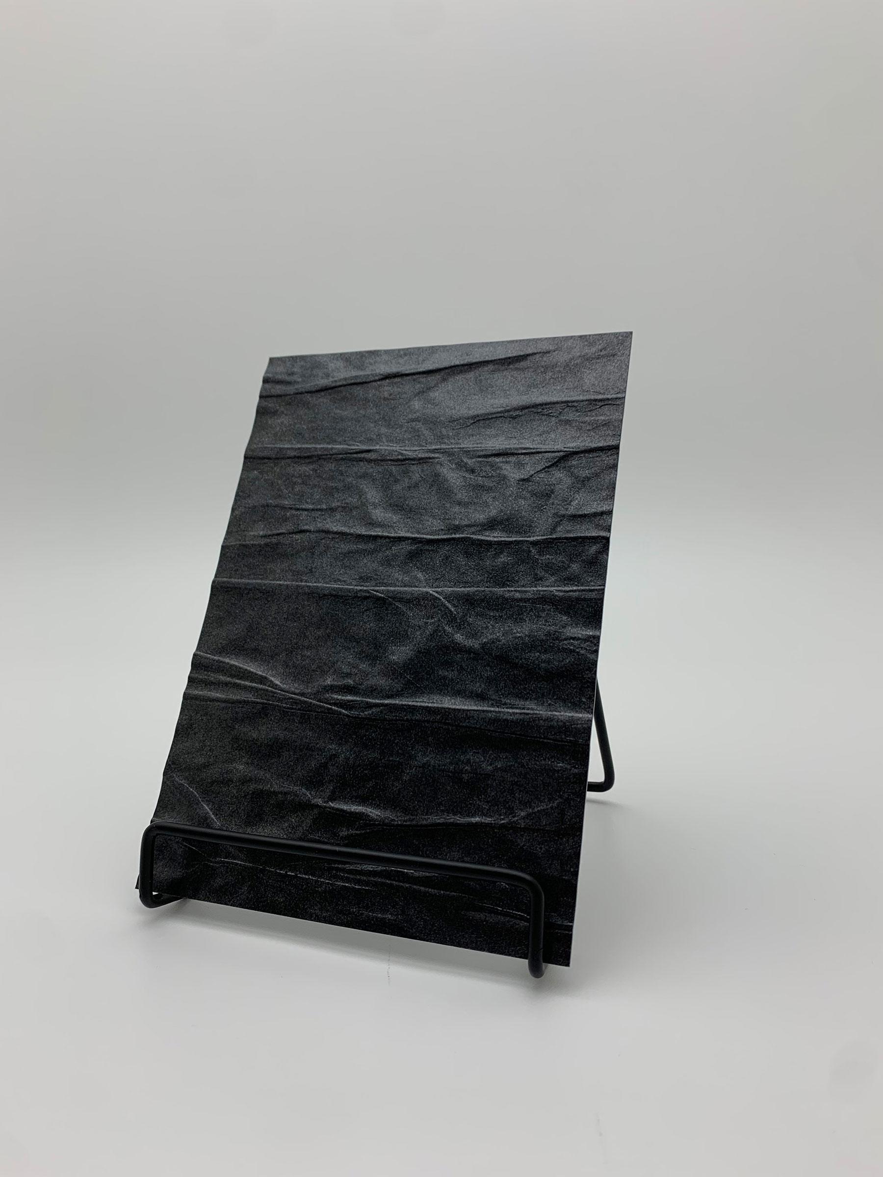 Elements Texture Iron Distortion real material sample - a softly crumpled surface in iron black