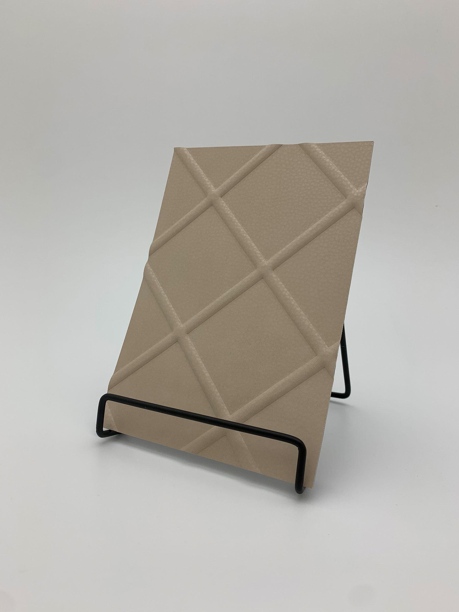 Elements Ivory Diamond Leather real material sample - ivory leather with a raised diamond-lattice emboss