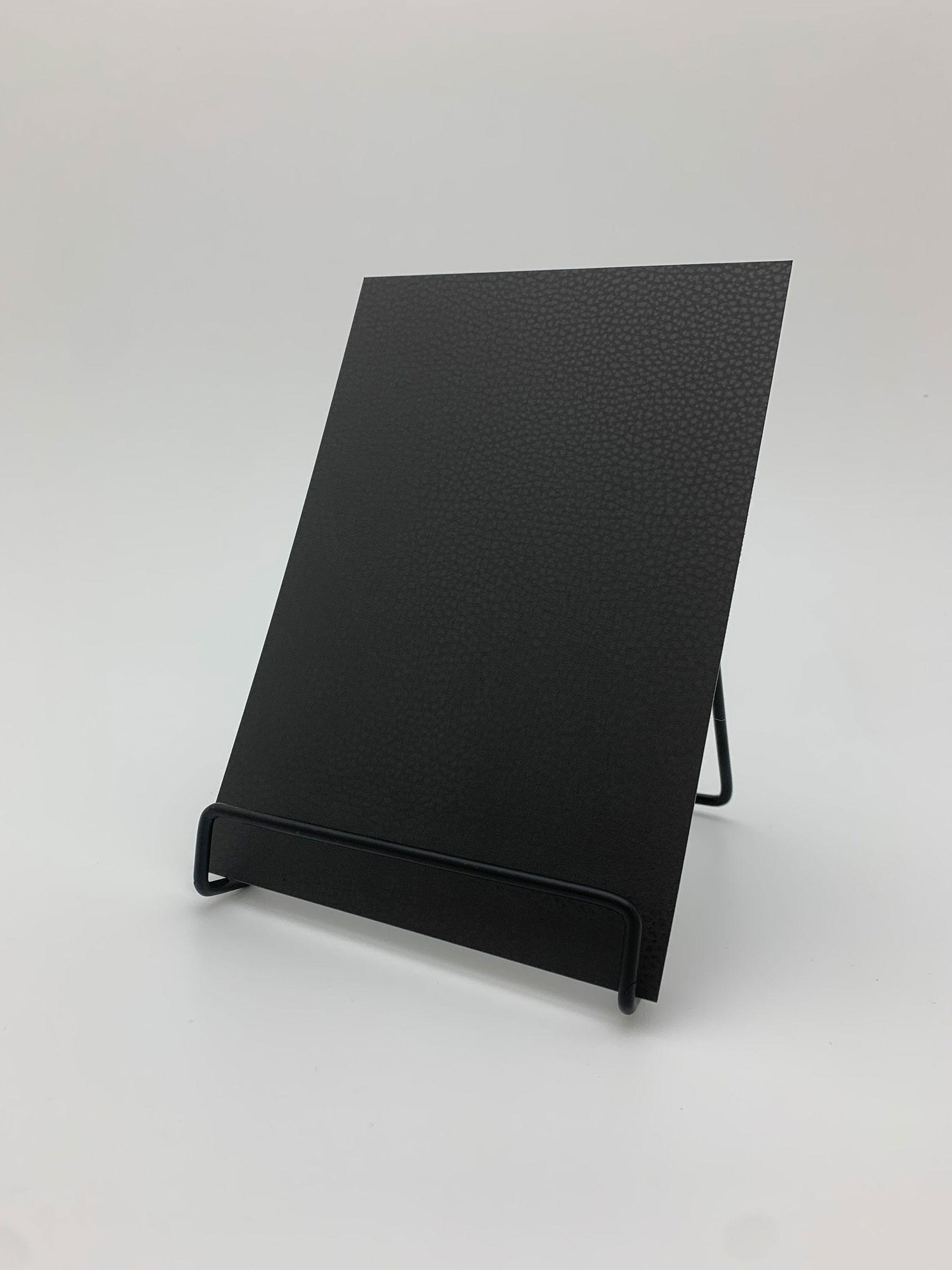 Elements Java Leather real material sample - a smooth, fine-grained near-black leather look