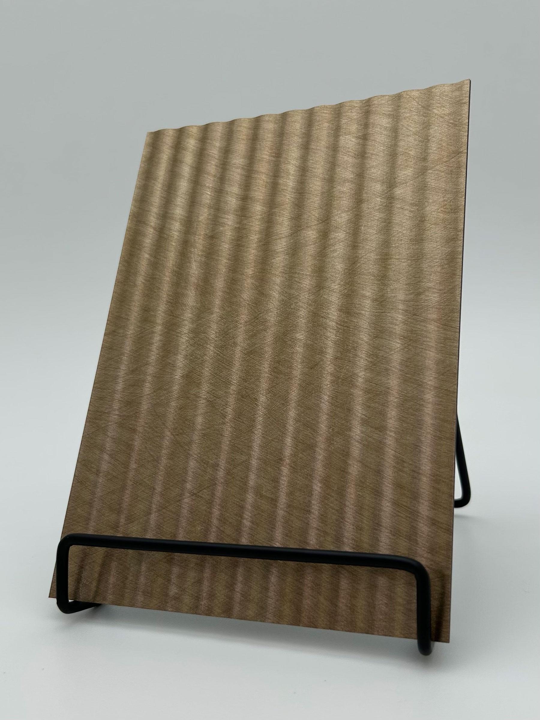 Elements Textile Low Tide Antique Gold real material sample - antique-gold panel with soft vertical ripples