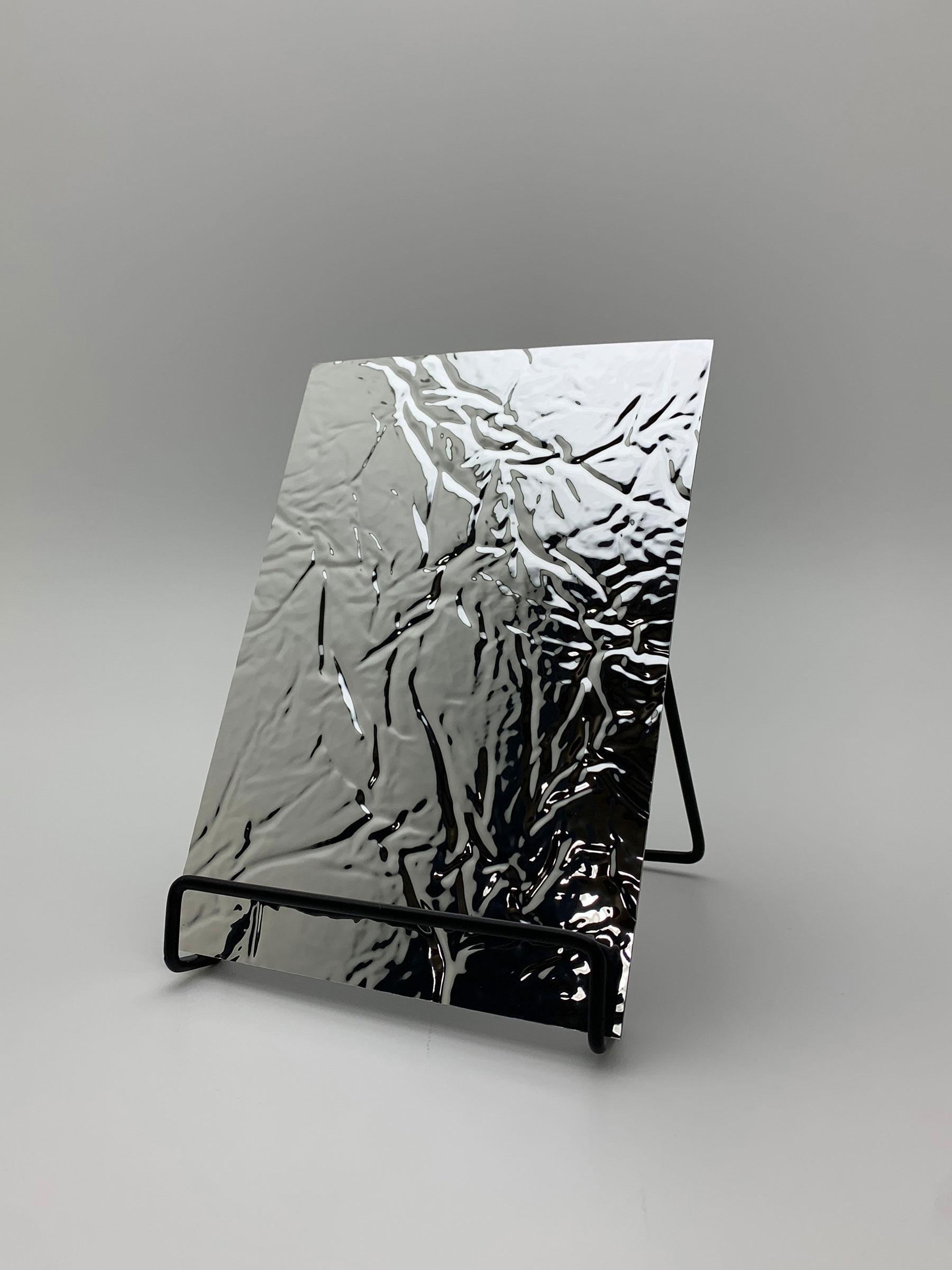 Elements Texture Silver Wrinkle real material sample - a crumpled, high-shine silver surface