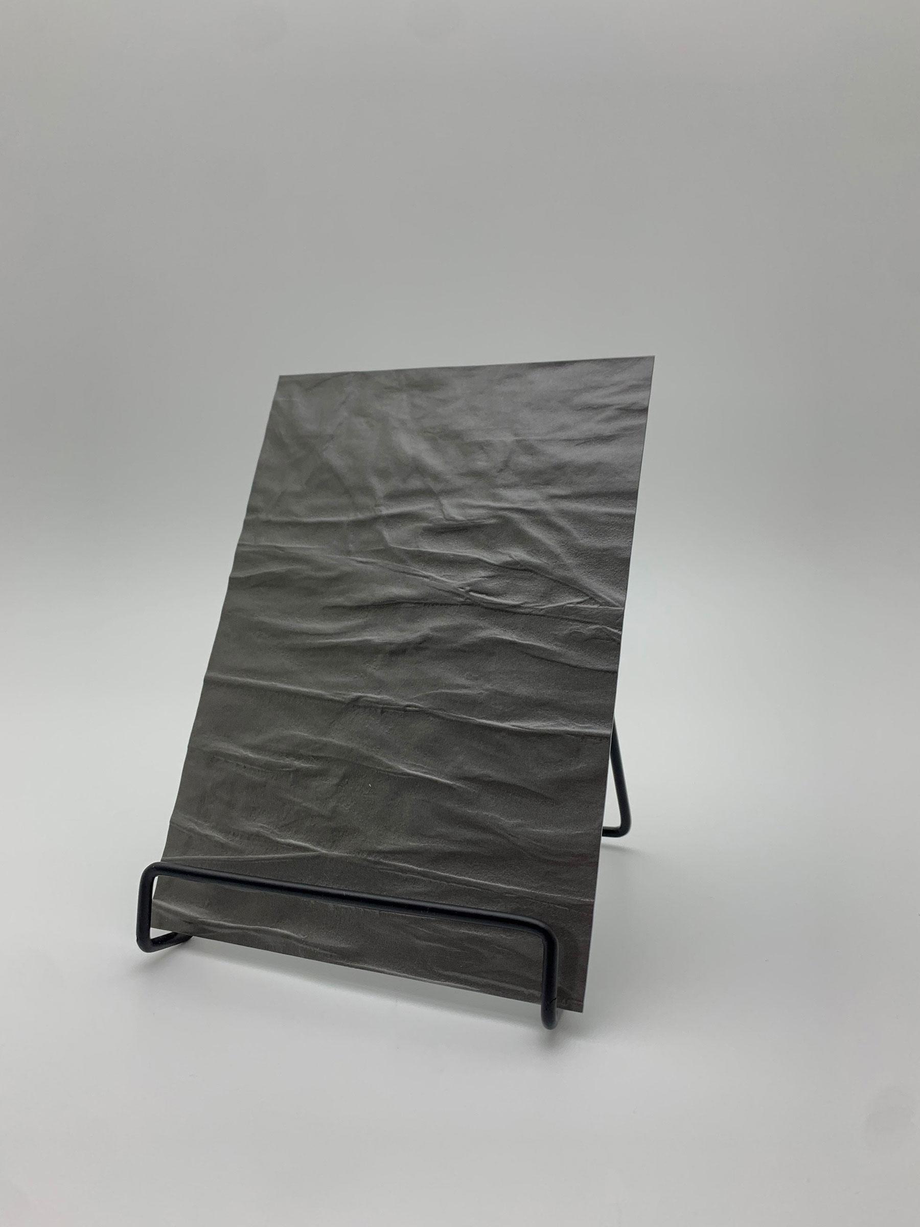 Elements Texture Smoke Distortion real material sample - a softly crumpled surface in smoky grey