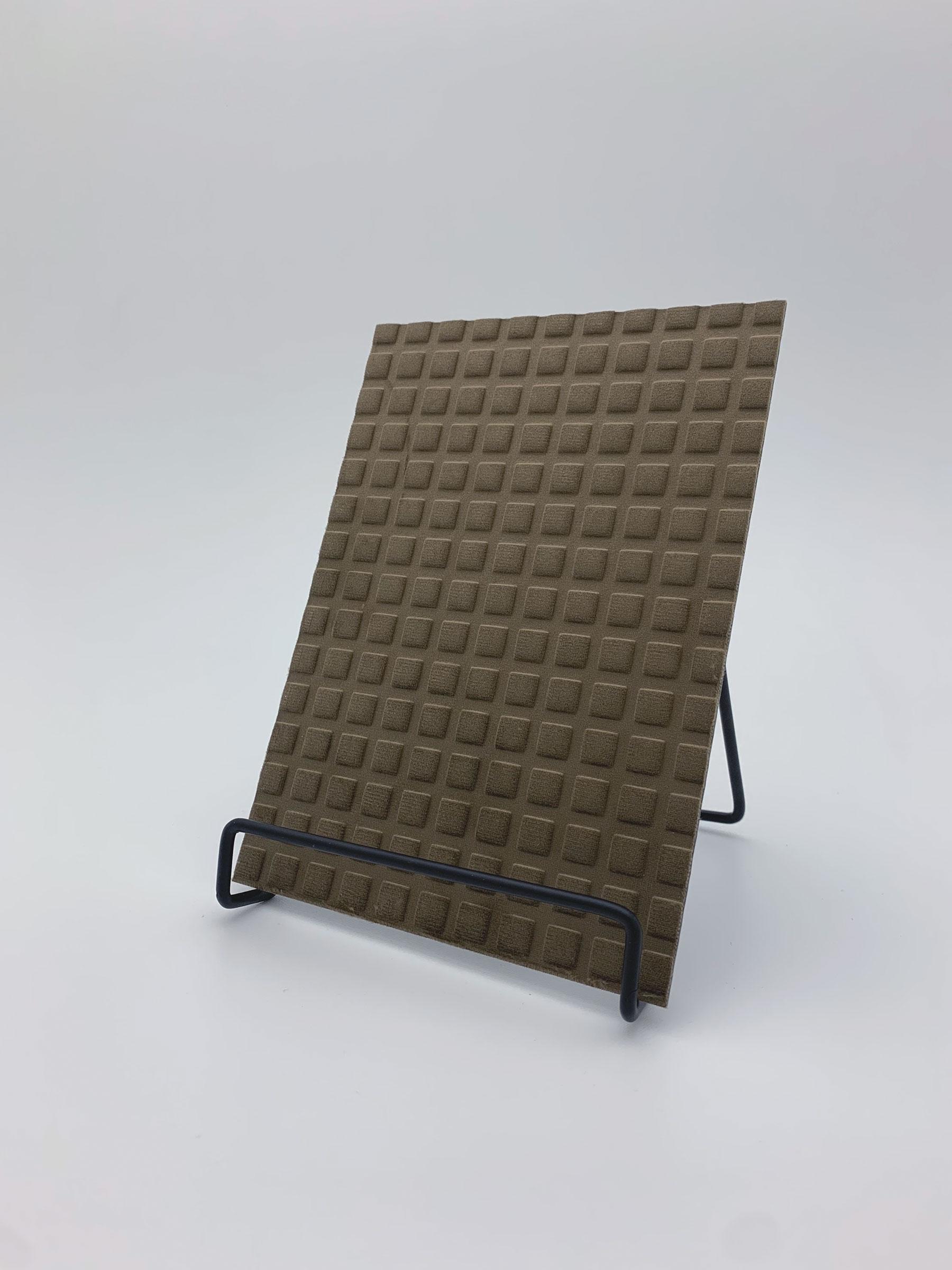 Elements Velvet Brown Pixels real material sample - a brown velvet with a raised grid of small squares