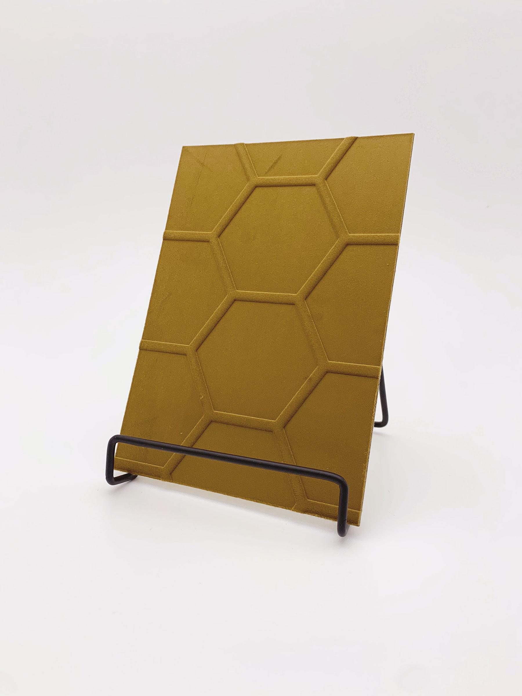 Elements Velvet Gold Honeycomb real material sample - a mustard-gold velvet with an embossed honeycomb grid