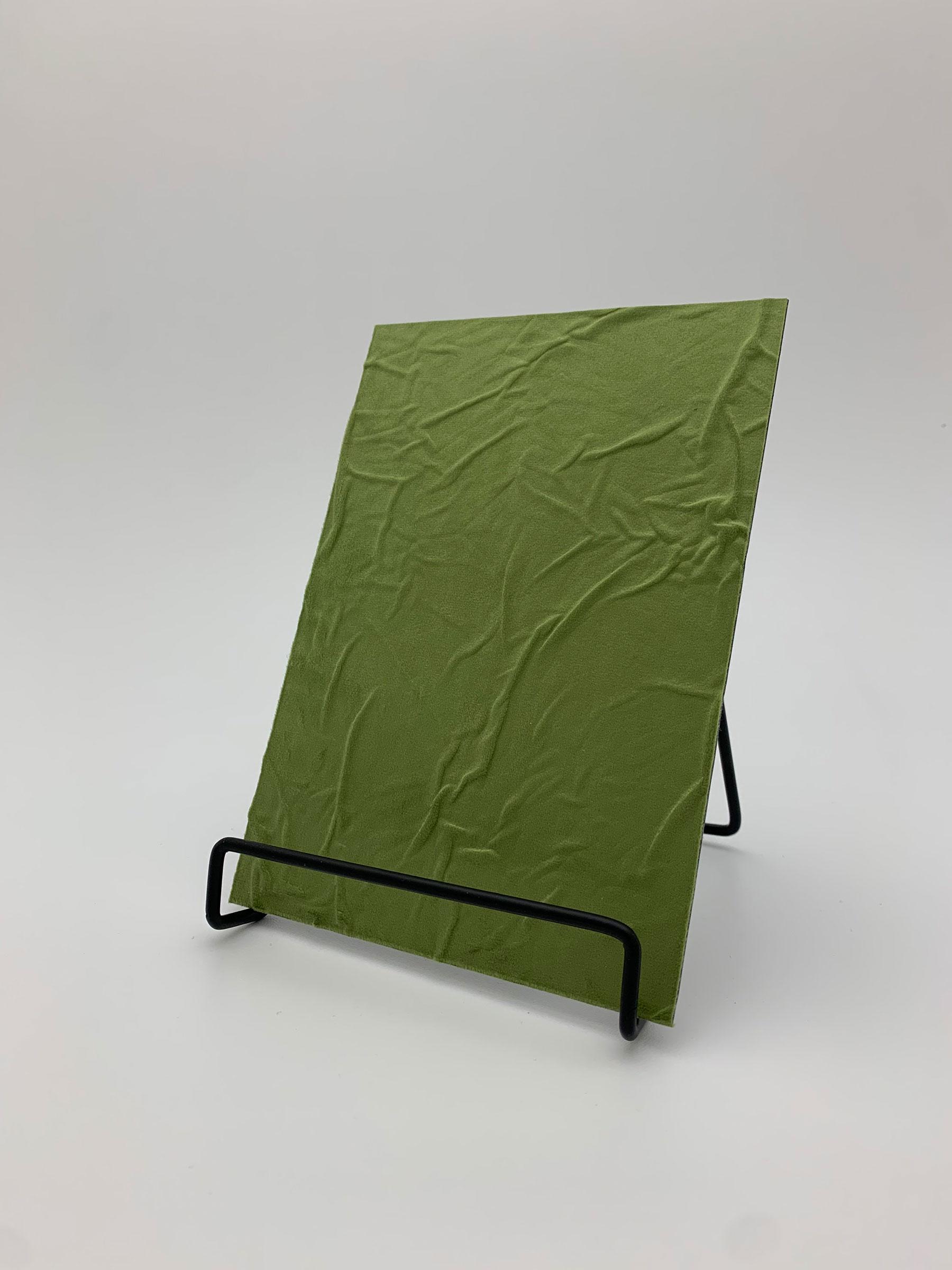 Elements Velvet Green Wrinkle real material sample - a crumpled velvet surface in moss green