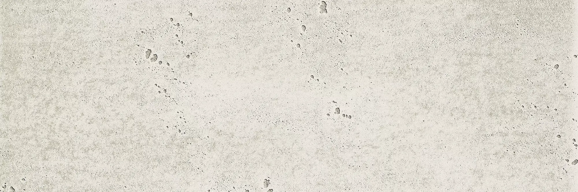 Aria Vintage Concrete real material sample - pale off-white concrete with fine pitting
