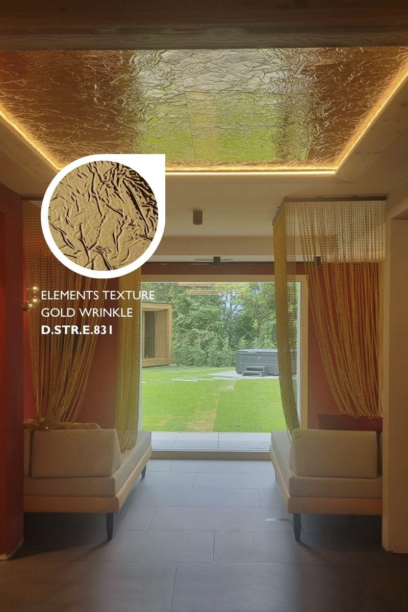 Elements Texture Gold Wrinkle laminate cladding a spa entry corridor ceiling with a hot tub visible outside