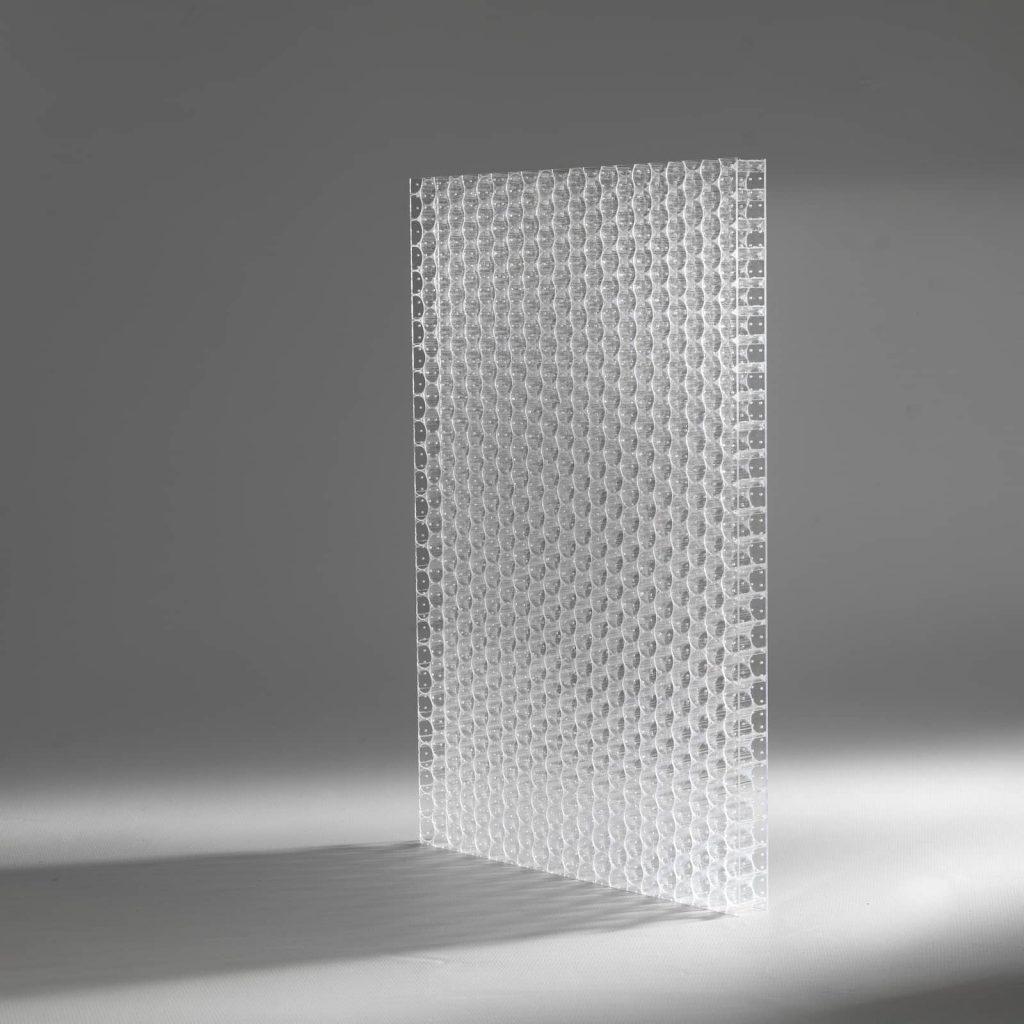 Luminous Rings Acoustic real material sample - clear standing panel with a dense grid of ring cells