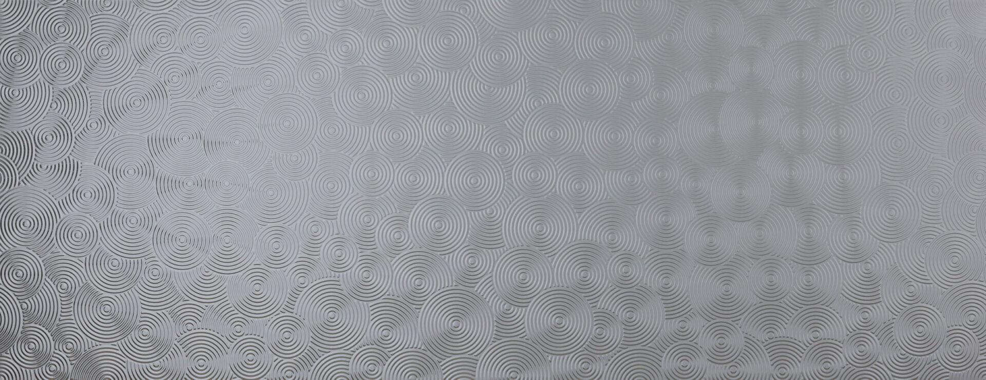 Elements Swell Silver real material sample - concentric ripple laminate